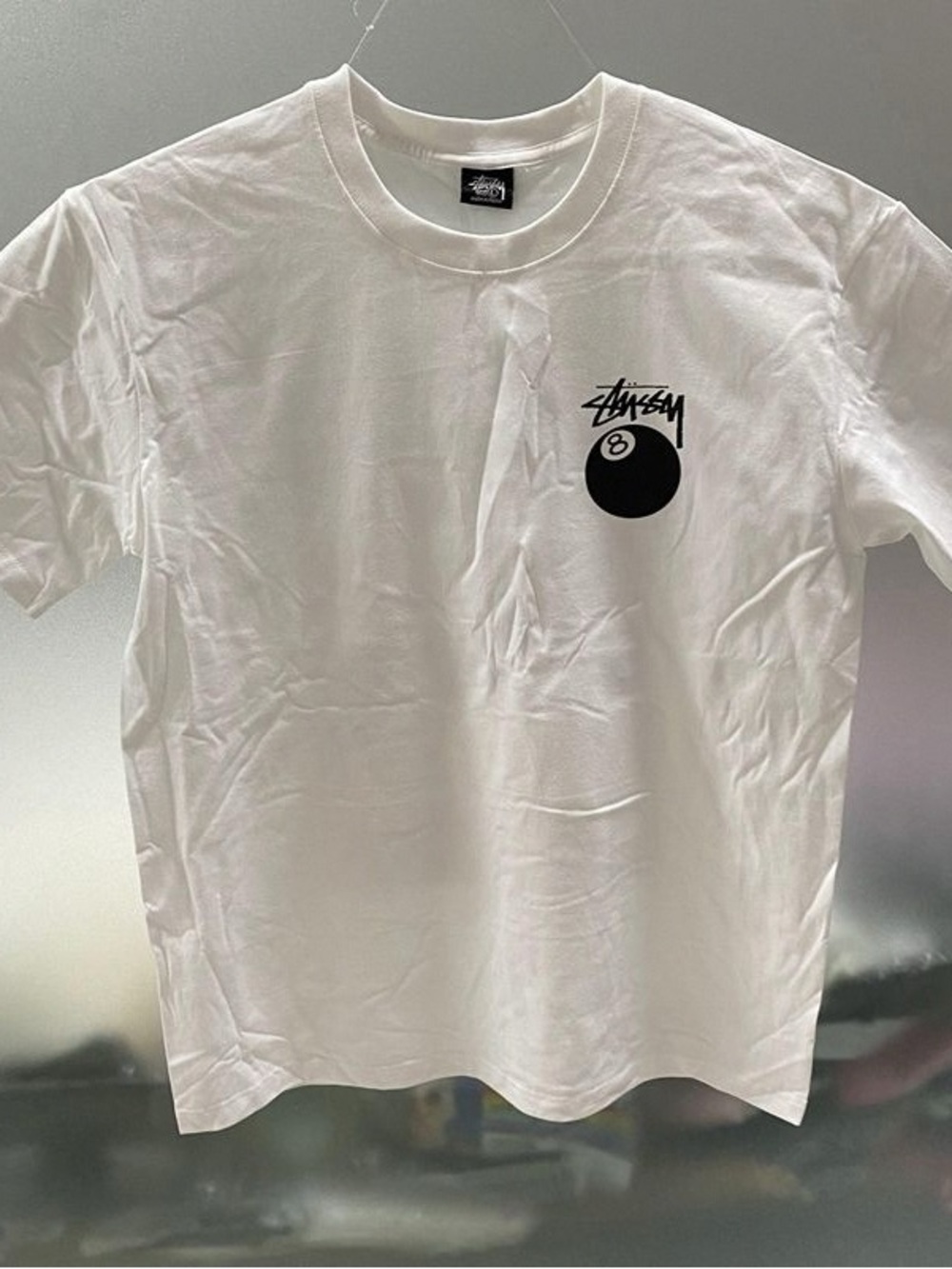 Stussy White Short Sleeve Tee with Black 8-Ball Chest Logo